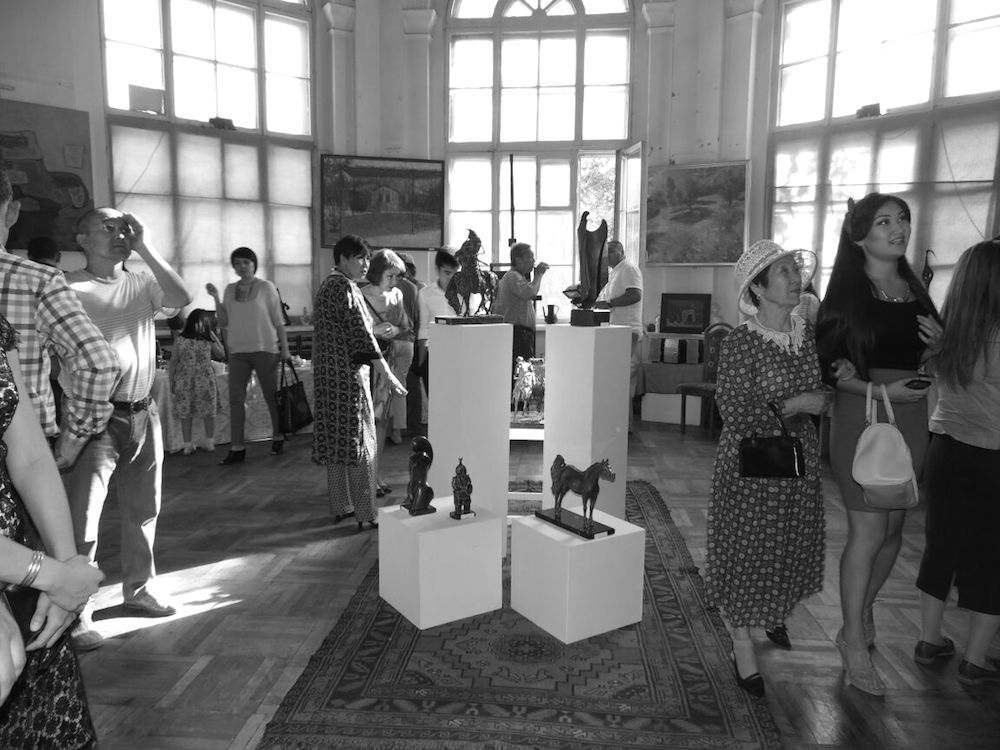 Guests at an exhibition opening in Gallery M in Bishkek