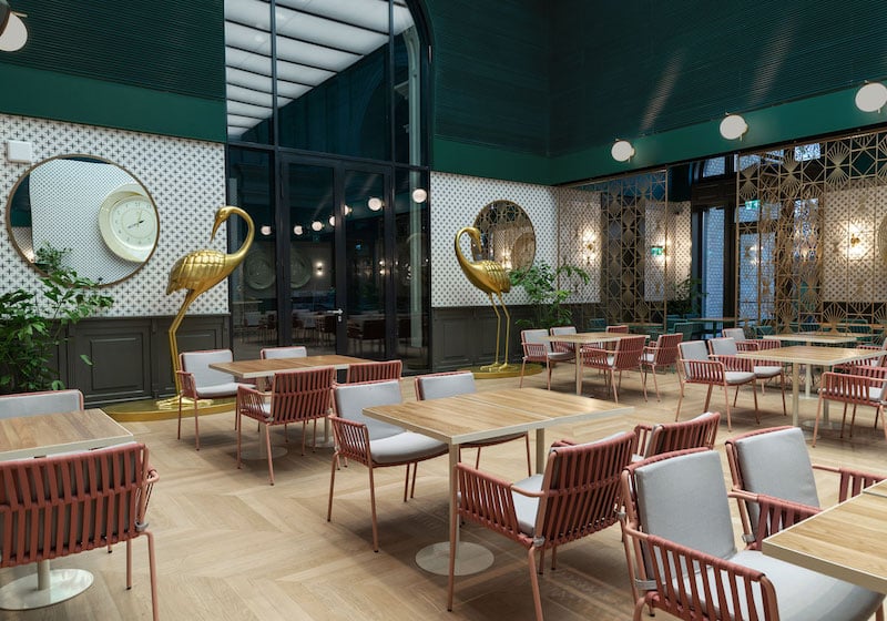 This cosy coral and sage-hued restaurant in Warsaw is already scooping up major design world prestige