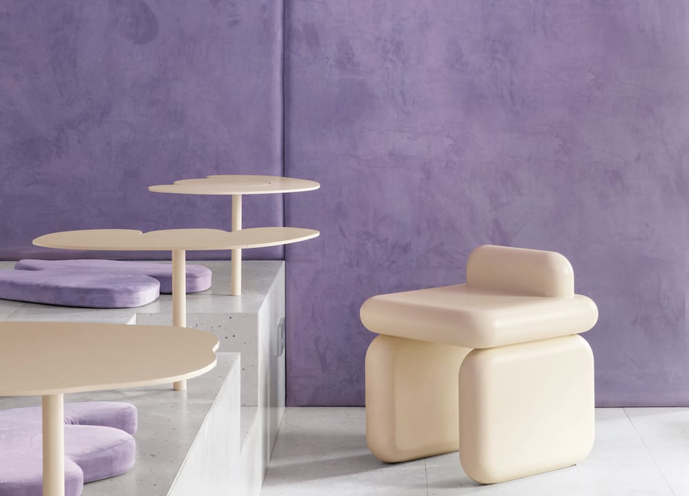 A purple and cream doughnut-inspired cafe in Voronezh is a sweet-tooth paradise