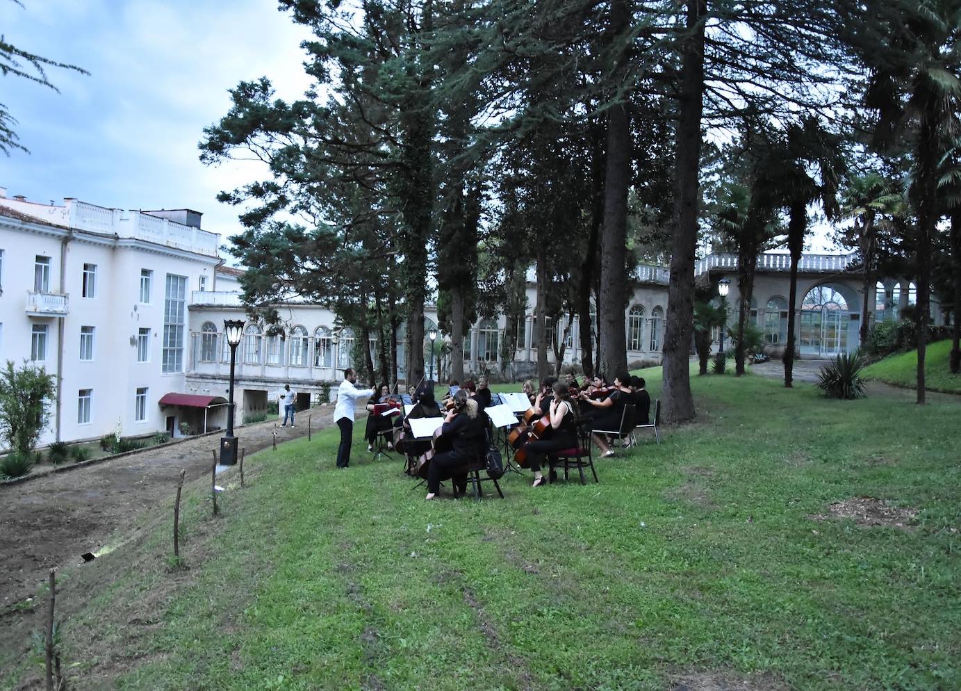 Watch as a Georgian orchestra performs for people quarantining in former Soviet sanatorium