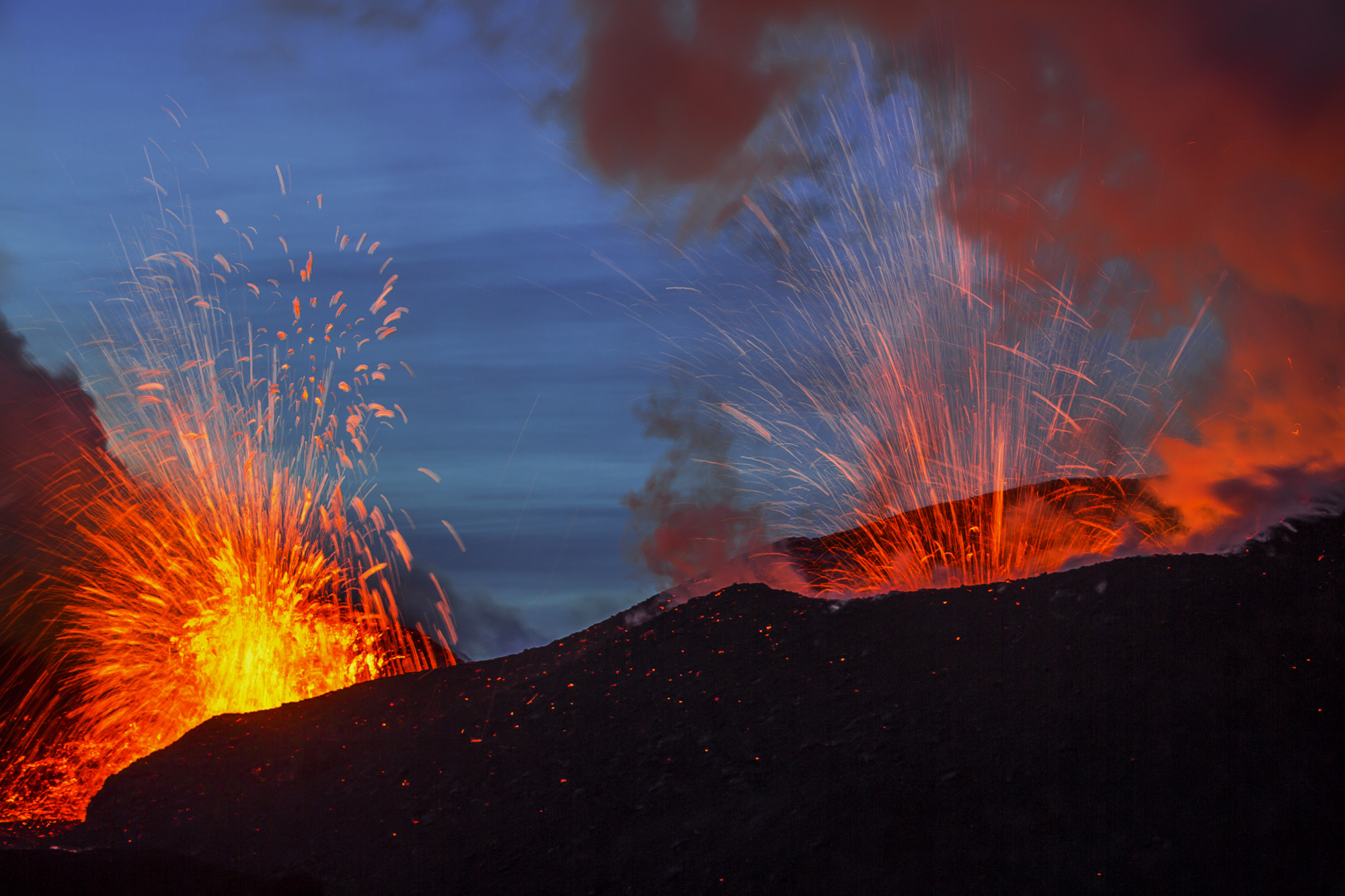 Plosky Tolbachik Volcano, Kamchatka. "A volcanic eruption is best filmed at dusk. Then it is not too dark around, the sky has a beautiful colour, and the magma glows. True, this can be very dangerous..." Image: Vladimir Alekseev/www.tpoty.com