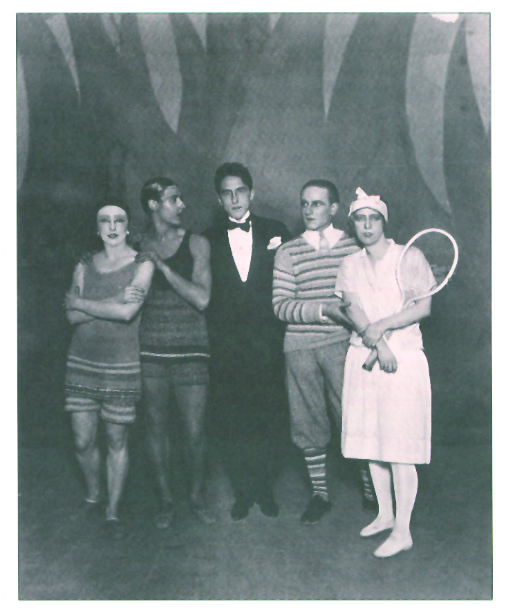 Jean Cocteau (centre) and Bronislava Nijinska (far right) with the cast of Le Train Bleu