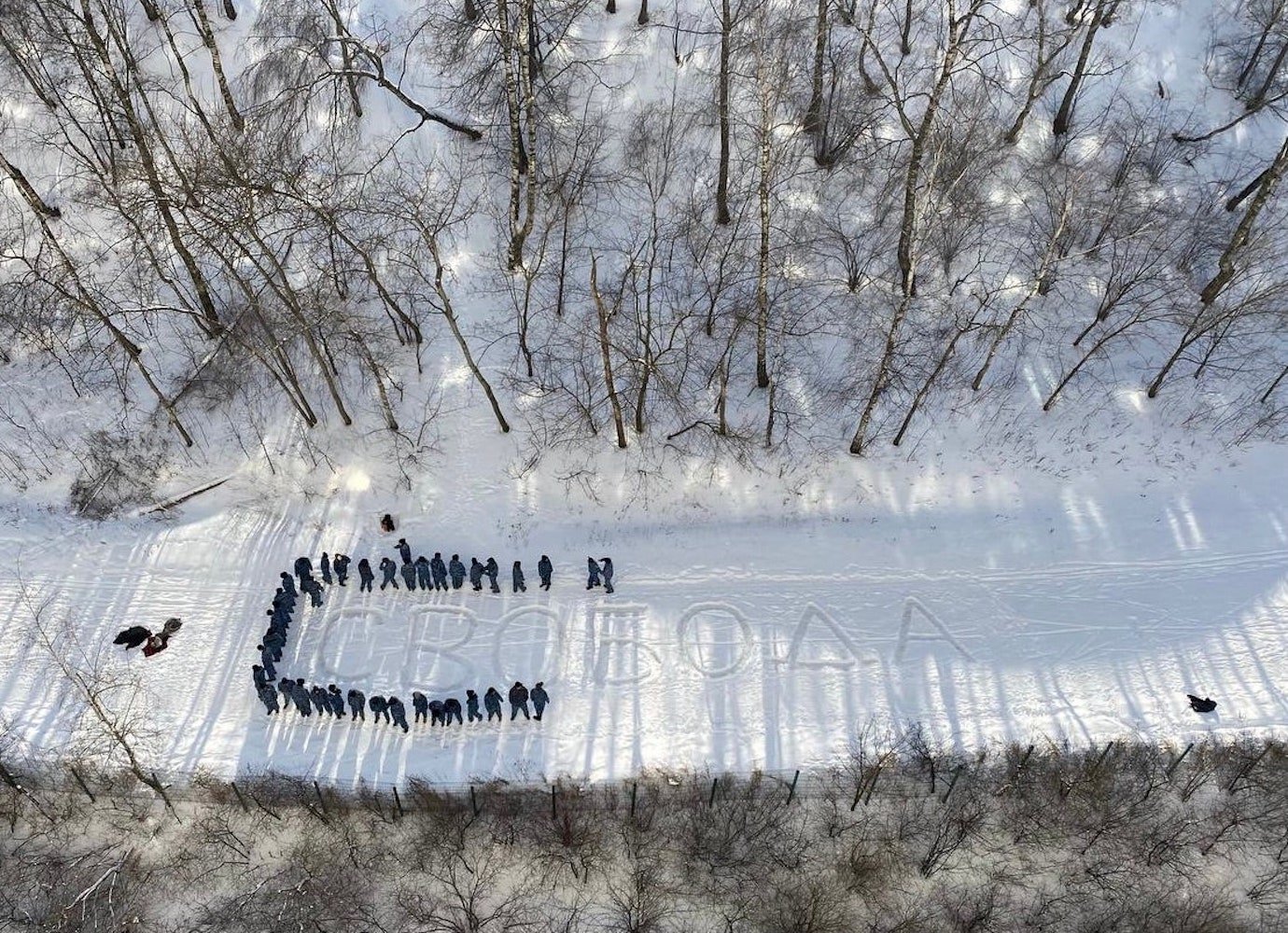 Russian photographer detained and fined after spelling out the word ‘freedom’ in snow 