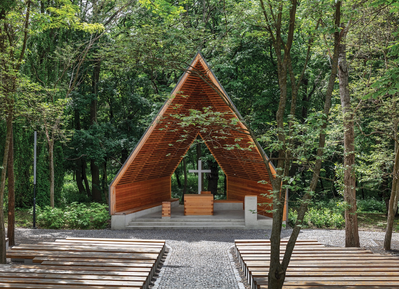 Hungarian architecture studio design modern open-air church made from a former Soviet monument plinth