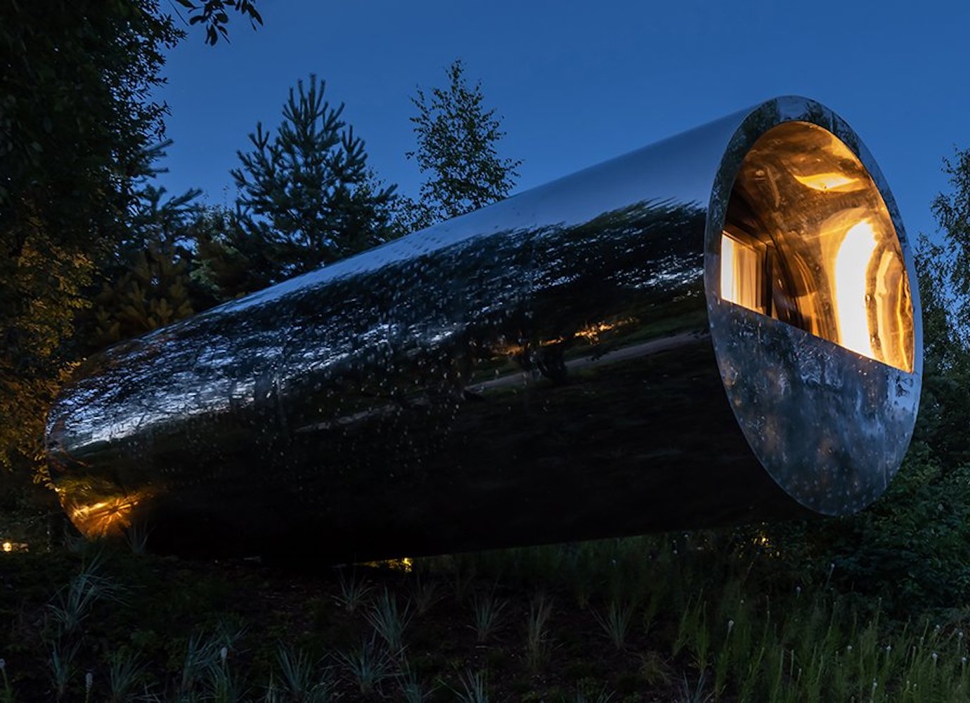 A minimalist, levitating home adds a touch of magic to a Russian forest