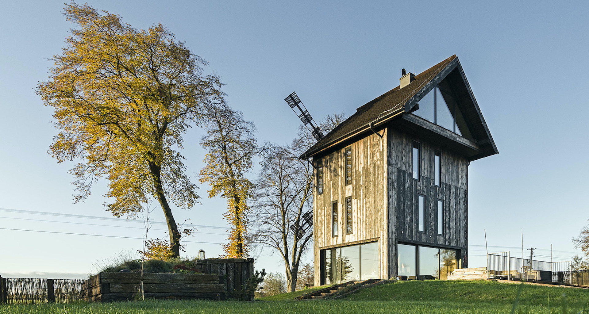 An old Polish mill is disassembled and rebuilt into a modern rural home | Concrete Ideas