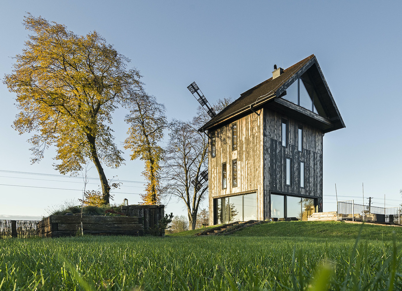 An old Polish mill is disassembled and rebuilt into a modern rural home | Concrete Ideas
