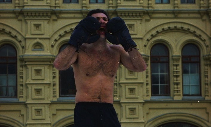 Performance also known as <em>Boxing champion</em> by Alexander Brener (1995)