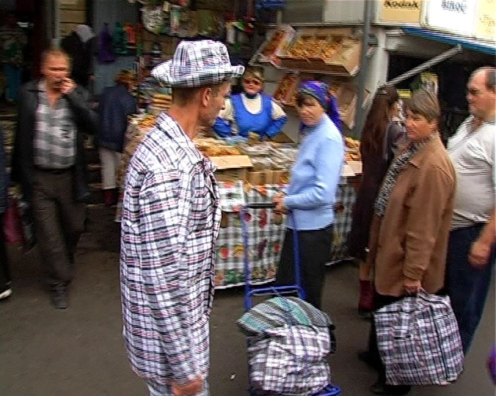 Ghenadie Popescu, <em>Torba (Bag)</em>, Film still from performance in Chisinau, Moldova. Image: Artist