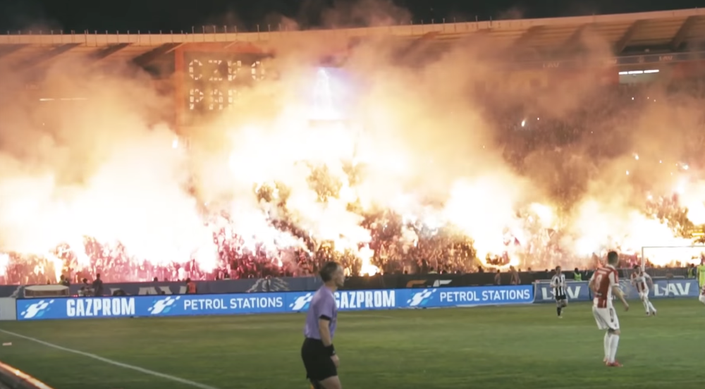 Fans let off flares and fireworks at a Red Star — Partizan derby in 2015. Image: COPA90/Youtube
