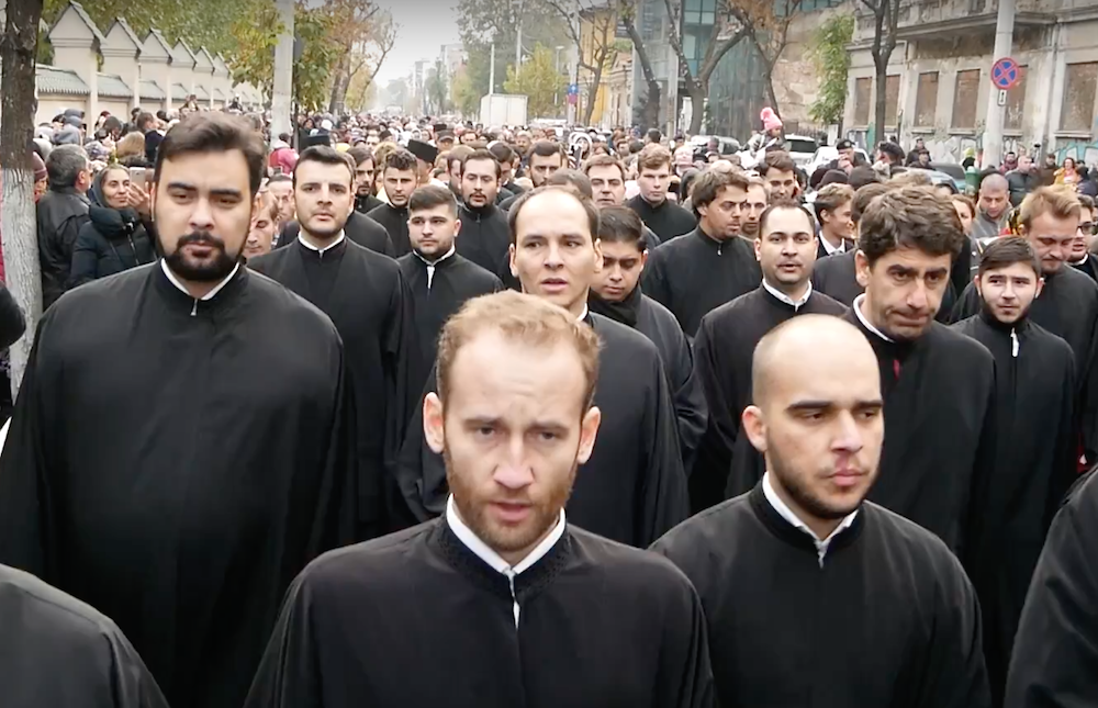 Romanian Orthodox priests walk the streets during Kirill’s visit to Bucharest. Image: Casa Jurnalistului/Youtube