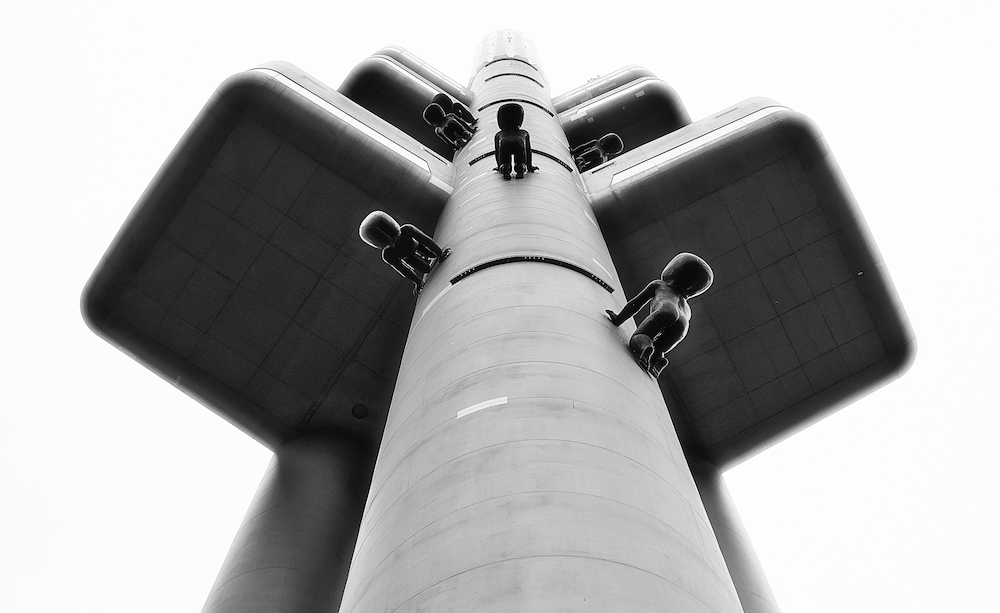 David Černý’s sculpture <em>Let the children play</em> on the side of the TV Tower