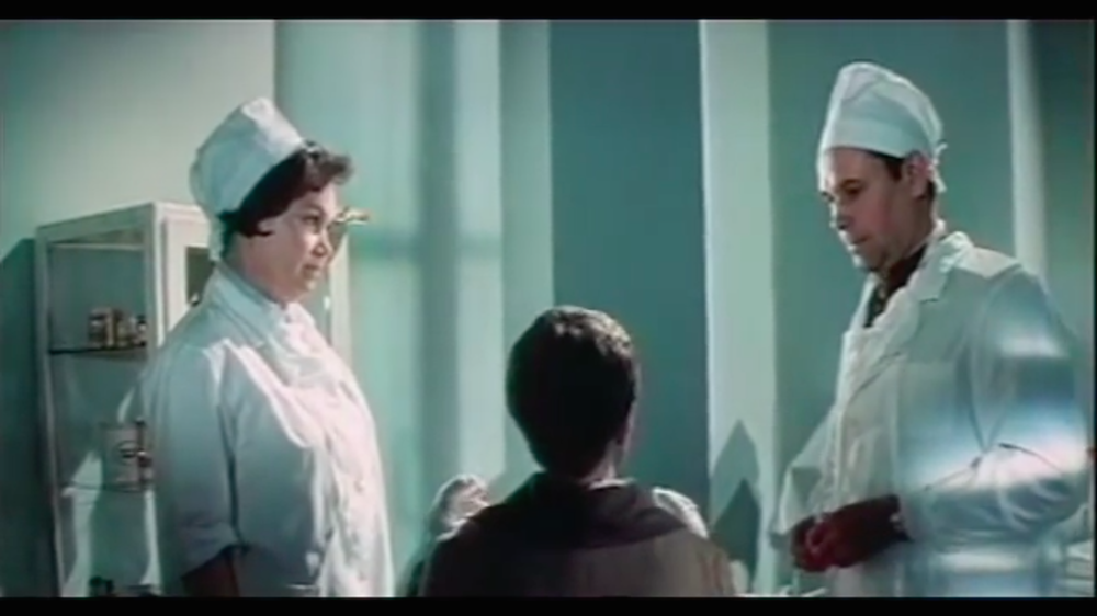 Aleksandr Shmelev (right) in his cameo as a plastic surgeon in <em>Skvorets and Lira</em> (image: Youtube)