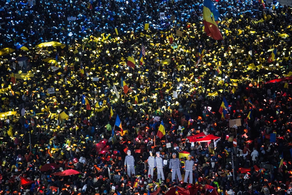 Protesters in Bucharest create an image of the Romanian flag during anti-corruption demonstrations in January. Image: Ioana Moldovan