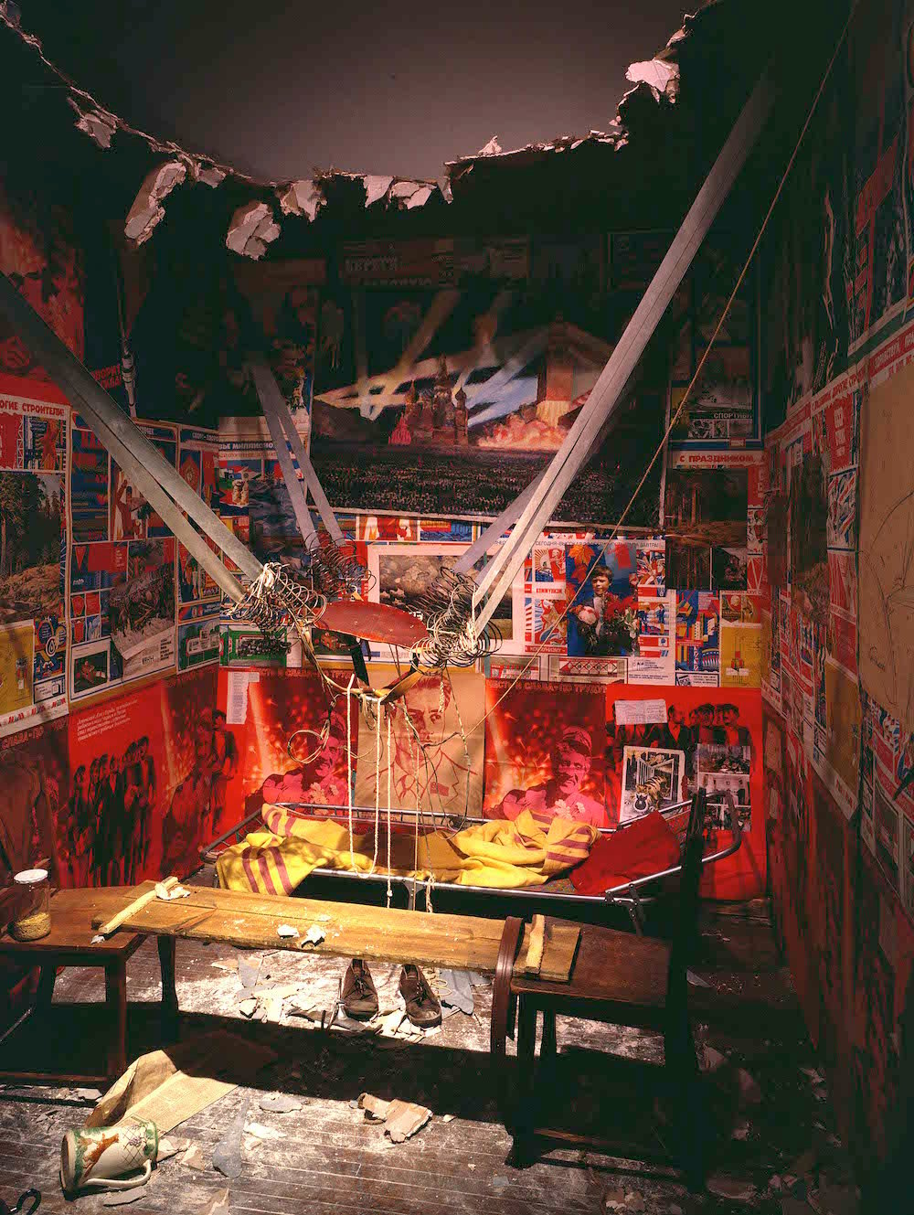 <em>The Man Who Flew Into Space From His Apartment</em> (1985) by Ilya Kabakov, on display at Tate Modern