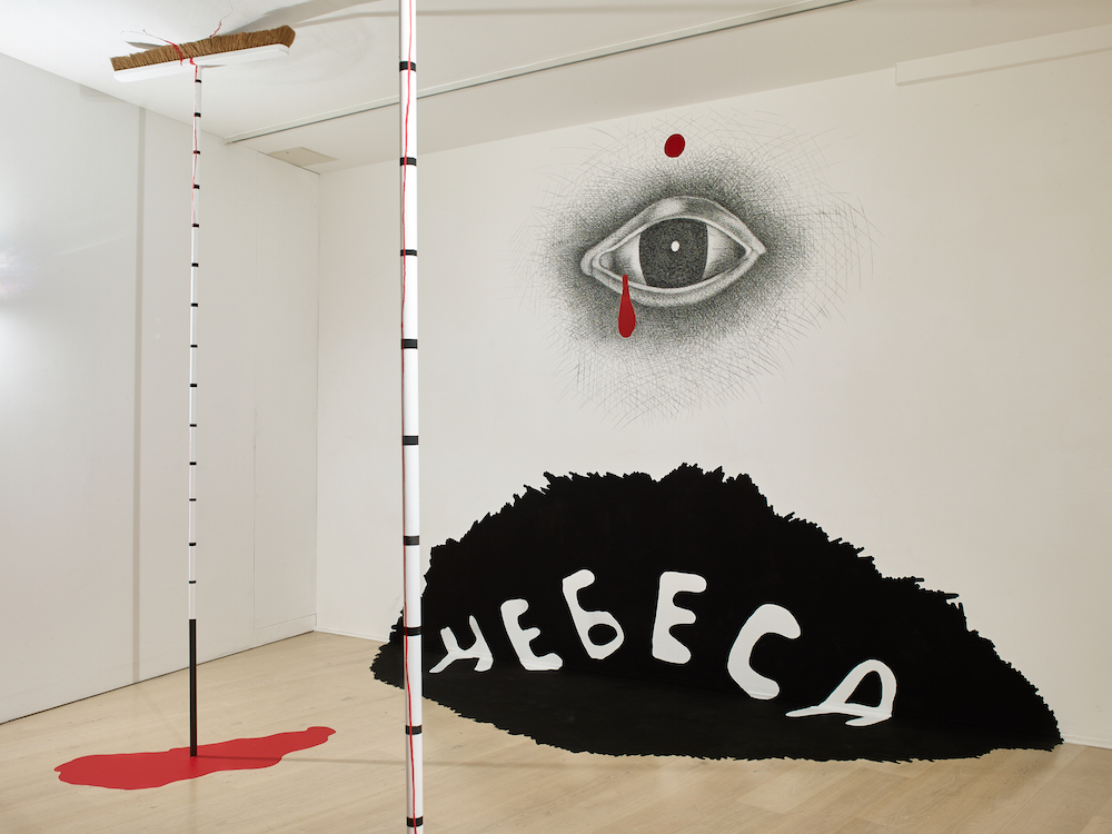 Installation based on a sketch from Dmitri Prigov’s <em>Series with Brooms</em> (2000s), on display at Calvert 22 Space. Image: Stephen White