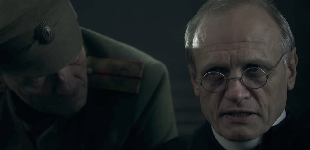 Witold Bieliński as Father Władysław Mendrala in <em>Broken Ear</em>. Image: Youtube