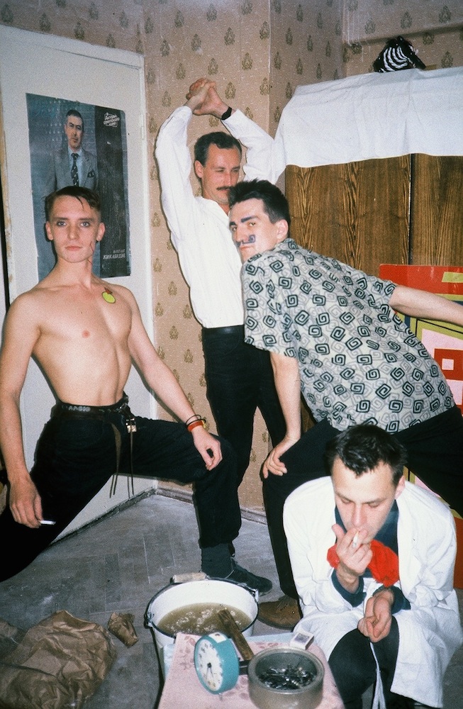 Georgy Guryanov, (E-E) Evgenij Kozlov, Timur Novikov & Igor Verichev in Kozlov’s flat (1987). Photograph: Paquita Escofet Miro courtesy of  Kozlov
