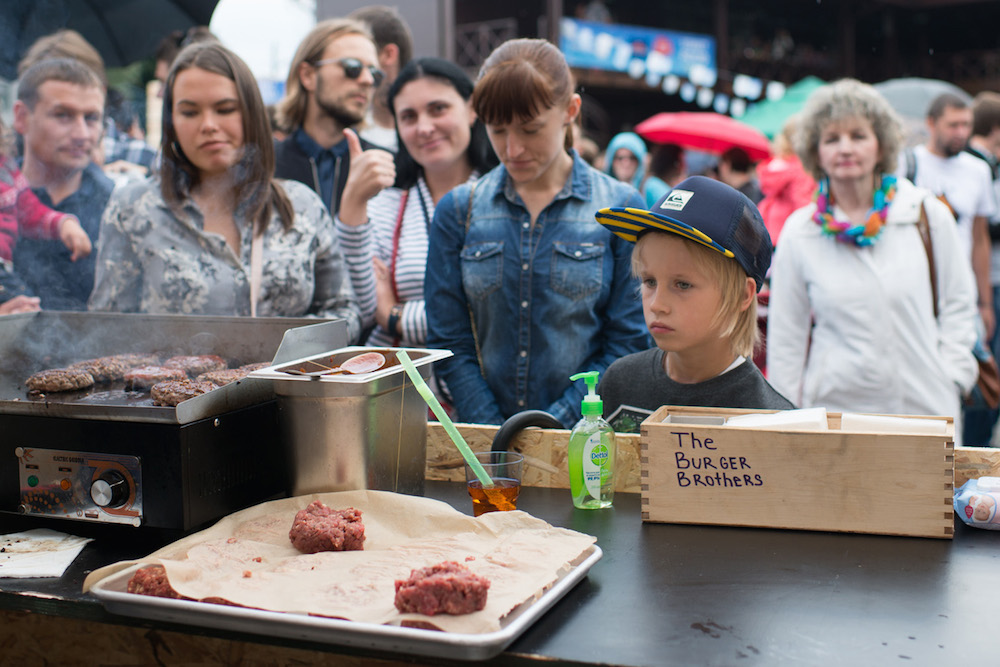 Locals wait for food at Moscow street food stall The Burger Brothers