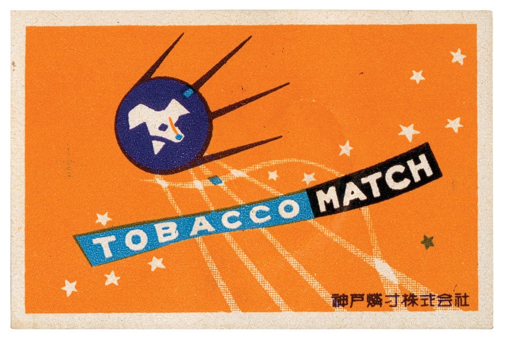 A Chinese matchbox label, depicting Laika in a Sputnik-style spacecraft