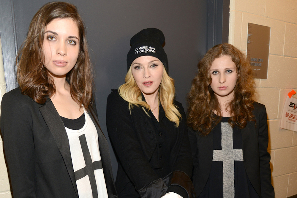 Nadya Tolokonnikoa (L) and Maria Alyokhina (R) with Madonna