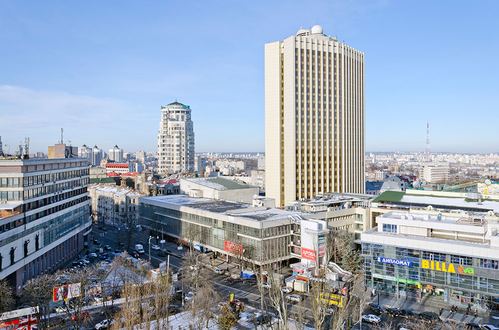 Lvivska Square. Left to right: House of Artists, House of Trade and House of Clothes, Supermarket Billa