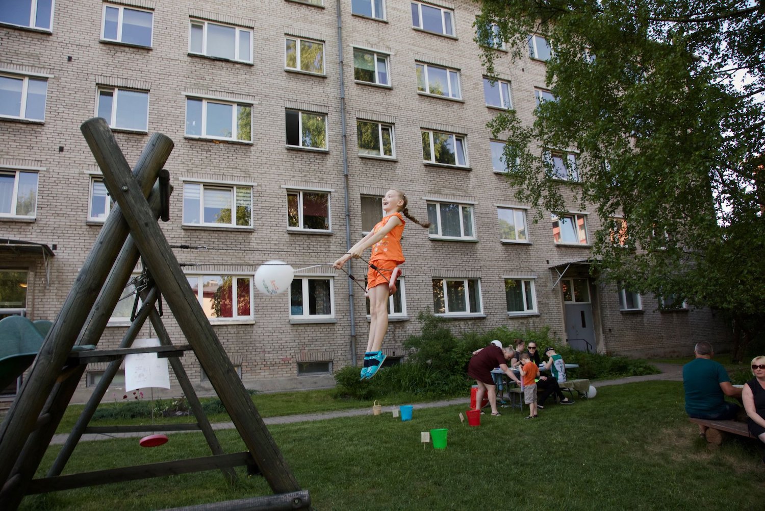 A child plays outside a Soviet-era housing block in Tartu.