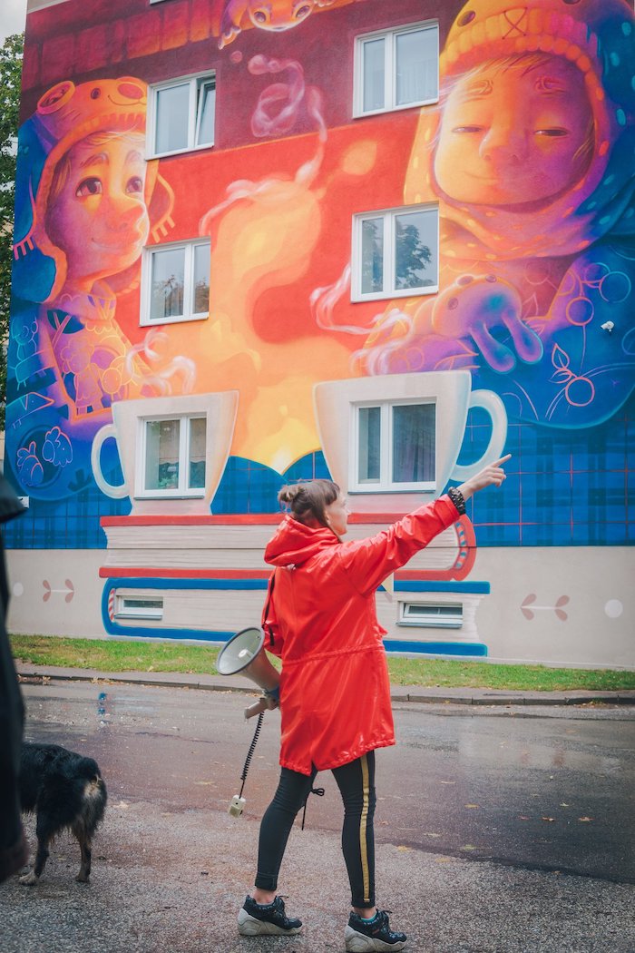 Residents take an art tour of the neighbourhood.