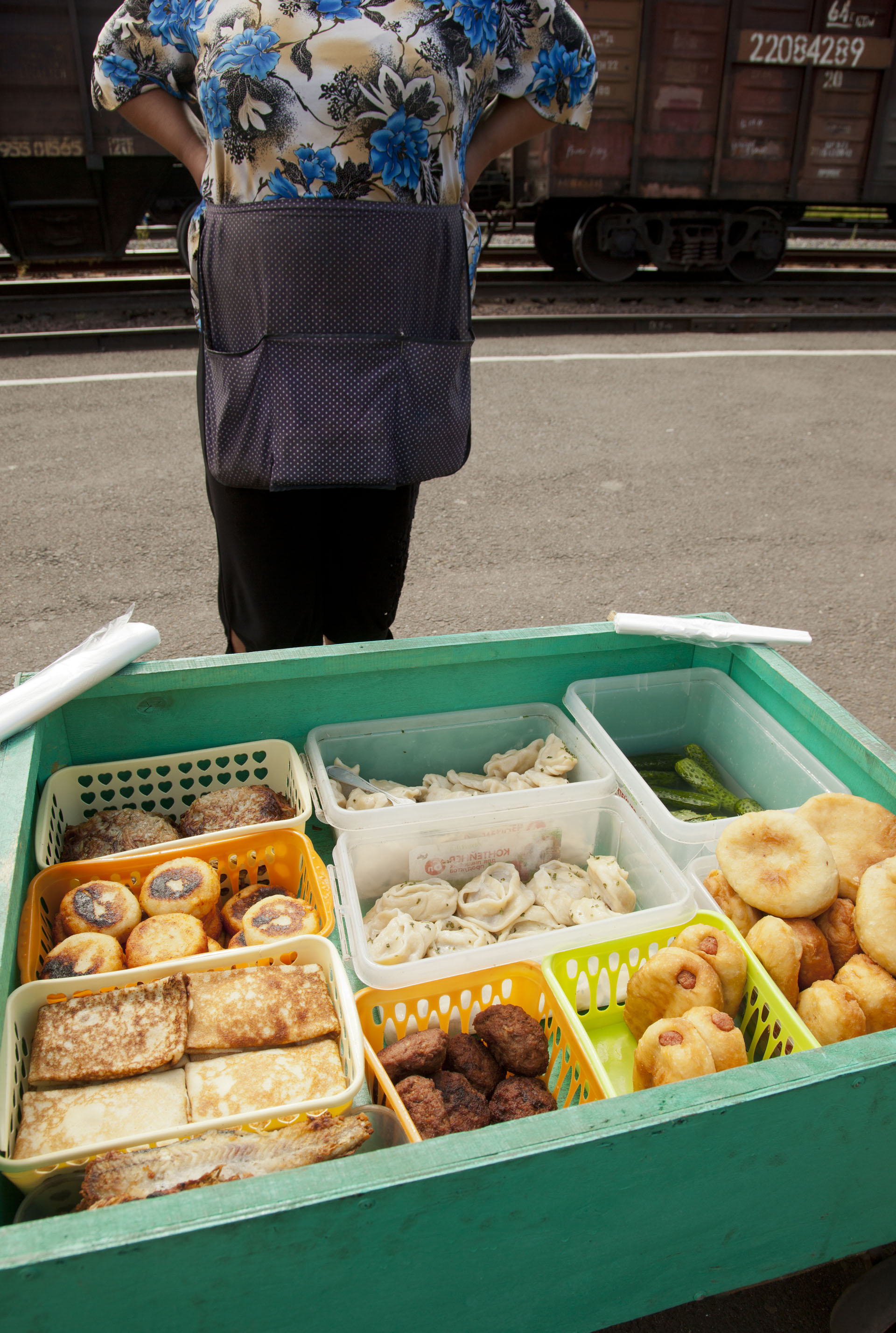Families make full incomes and grandmothers supplement their pensions by selling hot homemade goods to travellers on the Trans-Siberian railway no matter the time of day