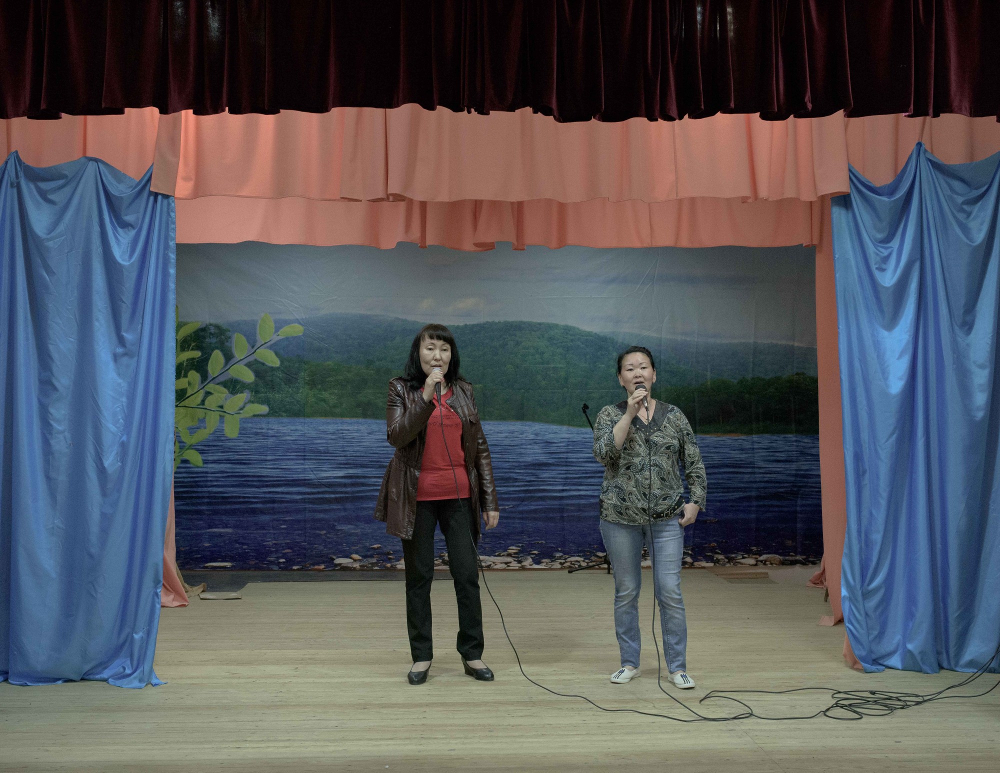 A local ensemble practices ahead of a national holiday dedicated to the anniversary of the Centre of Nanaian Culture, situated in the village of Jari