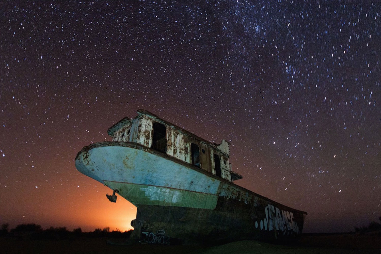 The night sky above rusting ships on the former Aral Sea. Image: Courtesy of Stihia Festival 