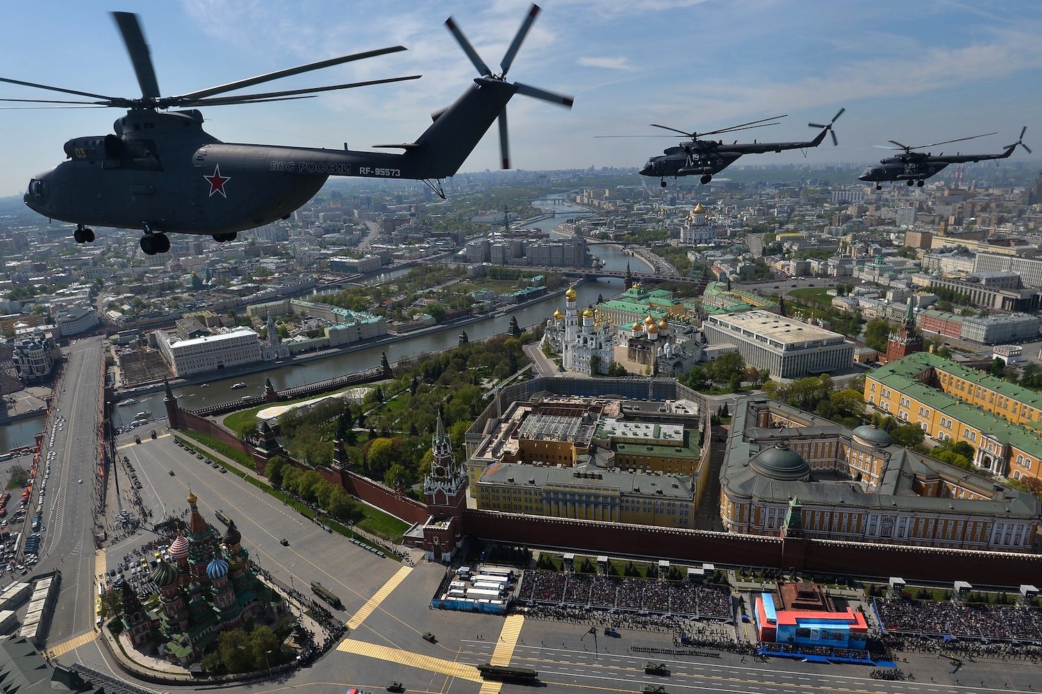 Helicopters fly over the Red Square Victory Day parade. Image: Russian Presidential Press Office/Wikimedia Commons