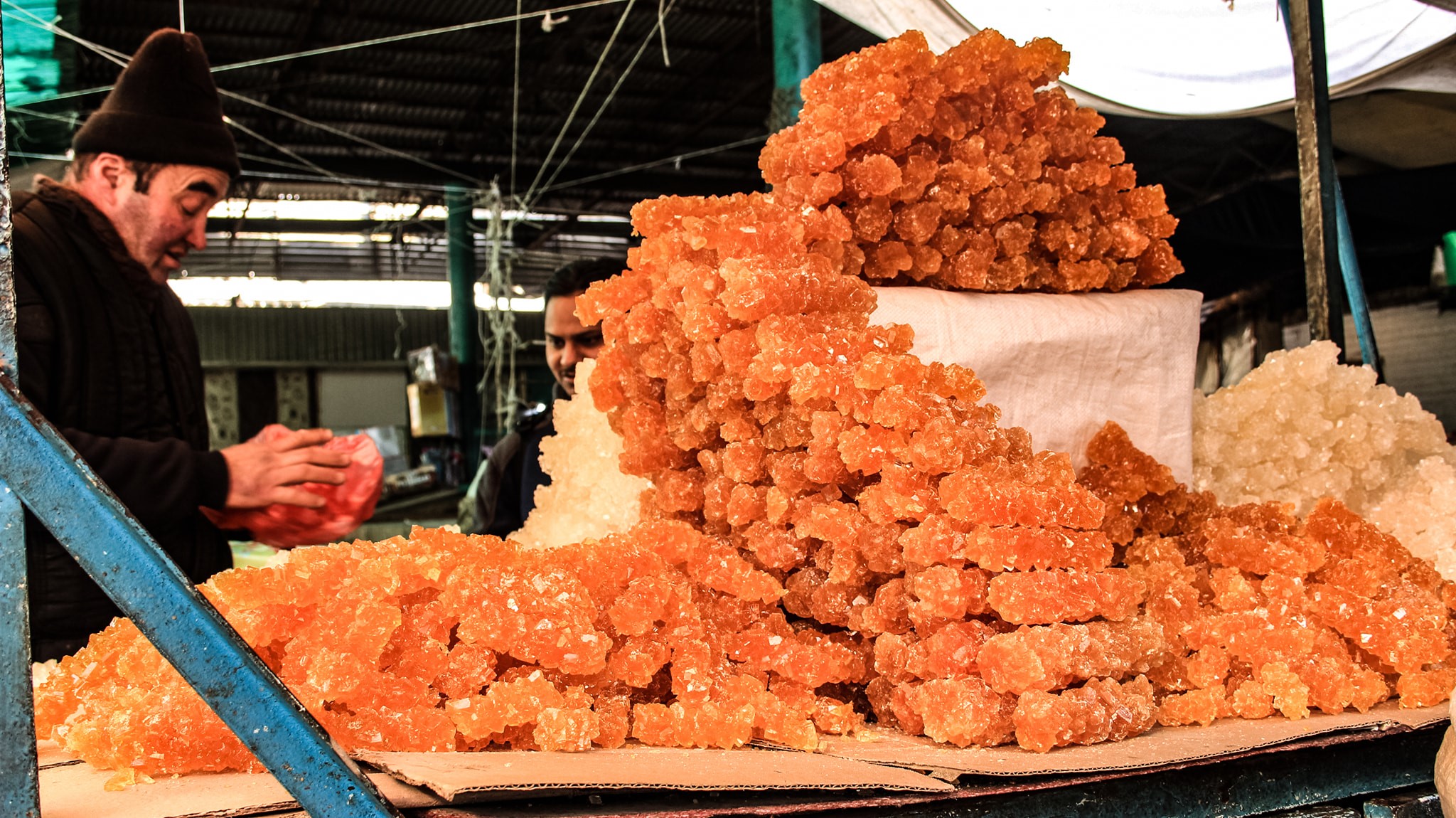 A market stand with sugar crystals in Osh, Kyrgyzstan