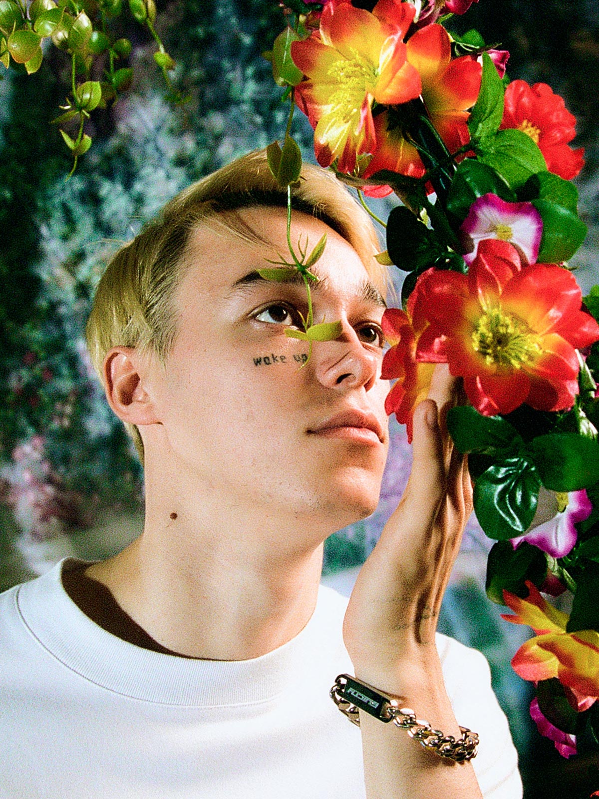 <p>Nick Gavrilov is known for his edgy portraiture which perfectly reflects the current wave of Russia’s youth culture. This one of Sasha Trautvein, one of the most hyped Russian faces on the international modelling scene, plays with 1980s technicolour aesthetics and classic composition. </p>