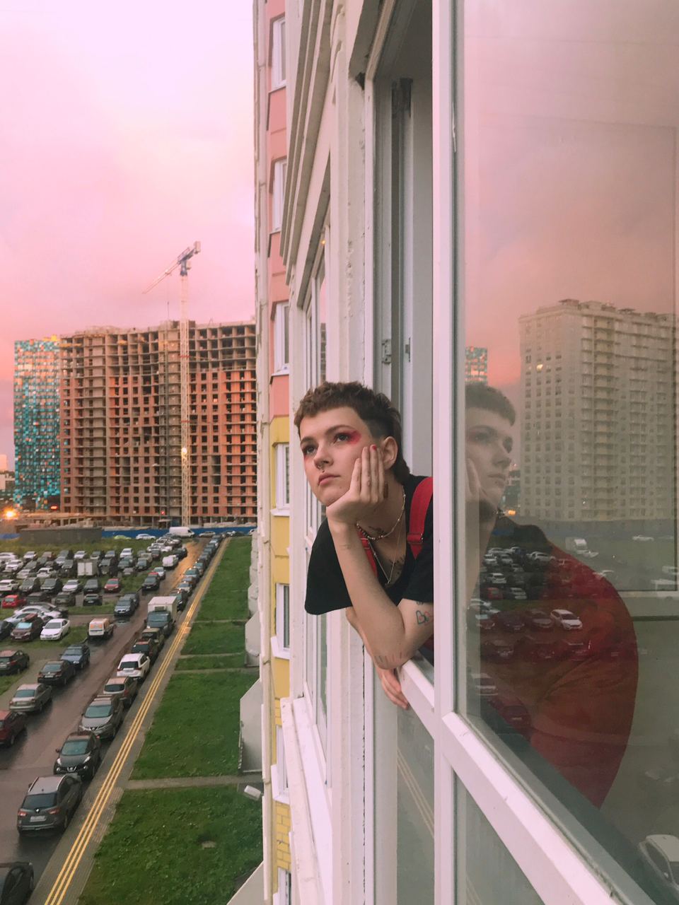 <p><b></b></p>

<p><span>This portrait of a non-binary queer activist Katya Voziyanova was taken by their friend Sam on the morning after their 21st birthday. The photo was taken in St Petersburg, and has a spirit of gentle candid romanticism, taken amid towering housing developments still under construction. “I think this picture was taken after we had champagne and cigarettes for breakfast. It was the morning after my birthday and it was our 19th hour of nonstop drinking, because that’s what you do when you turn 21. It was a good day in the midst of the end of the world,” Voziyanova remembers. </span></p>