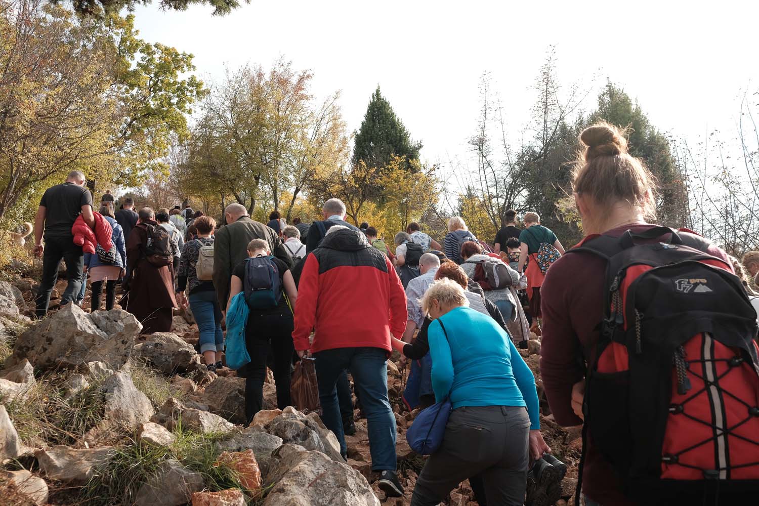 Pilgrims walk towards the site where the Virgin Mary allegedly appeared in 1981. Taken in November 2019.