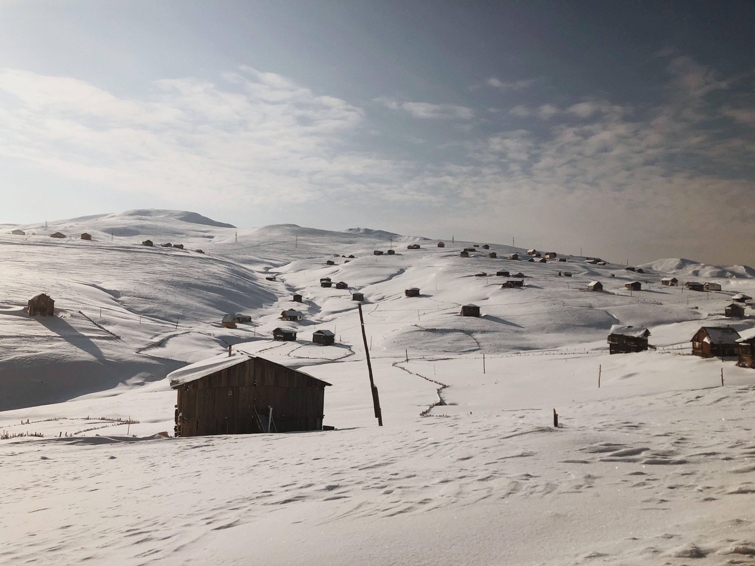 Summer huts line the slopes east of Goderdzi Pass