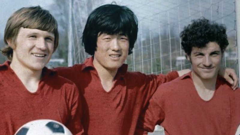 Mikhail An (centre) with his teammates.