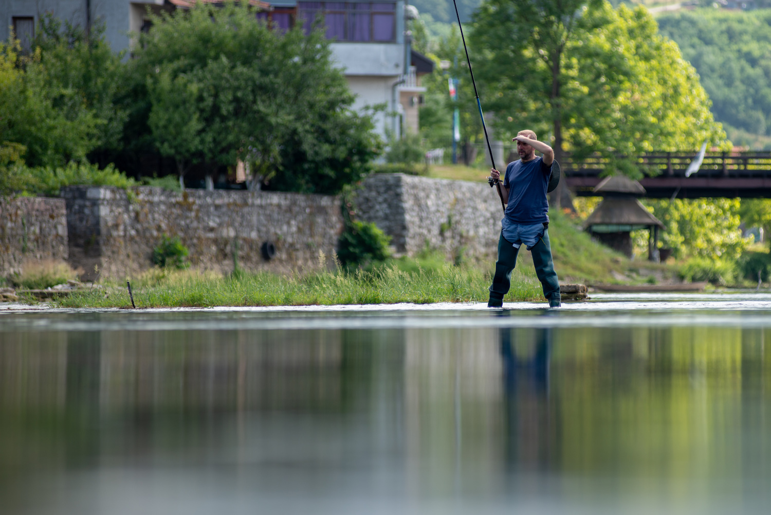 Šehić fishing on the river Una. Image: Dino Isaković