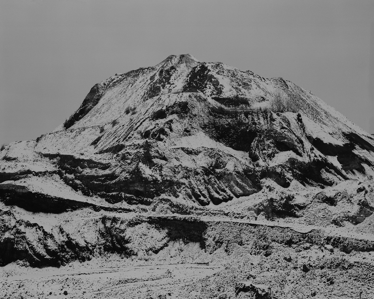 The Spoil tip, built over the decades from mining waste, is slowly being dismantled to recover various raw materials.