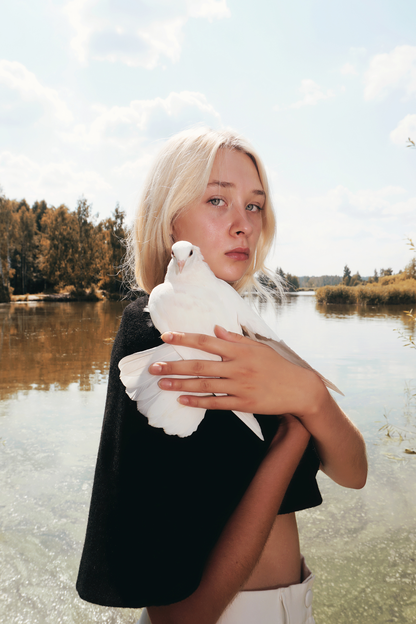 <p>Julia Kaydala took this photo for fashion label OKKINO. “I wanted to create a sense of unity, calm, and acceptance. So the shoot was slightly spontaneous: I headed to the countryside with my friends and we roamed around looking for interesting locations. White doves reflect this spirit and symbolise freedom,” the photographer says. </p>