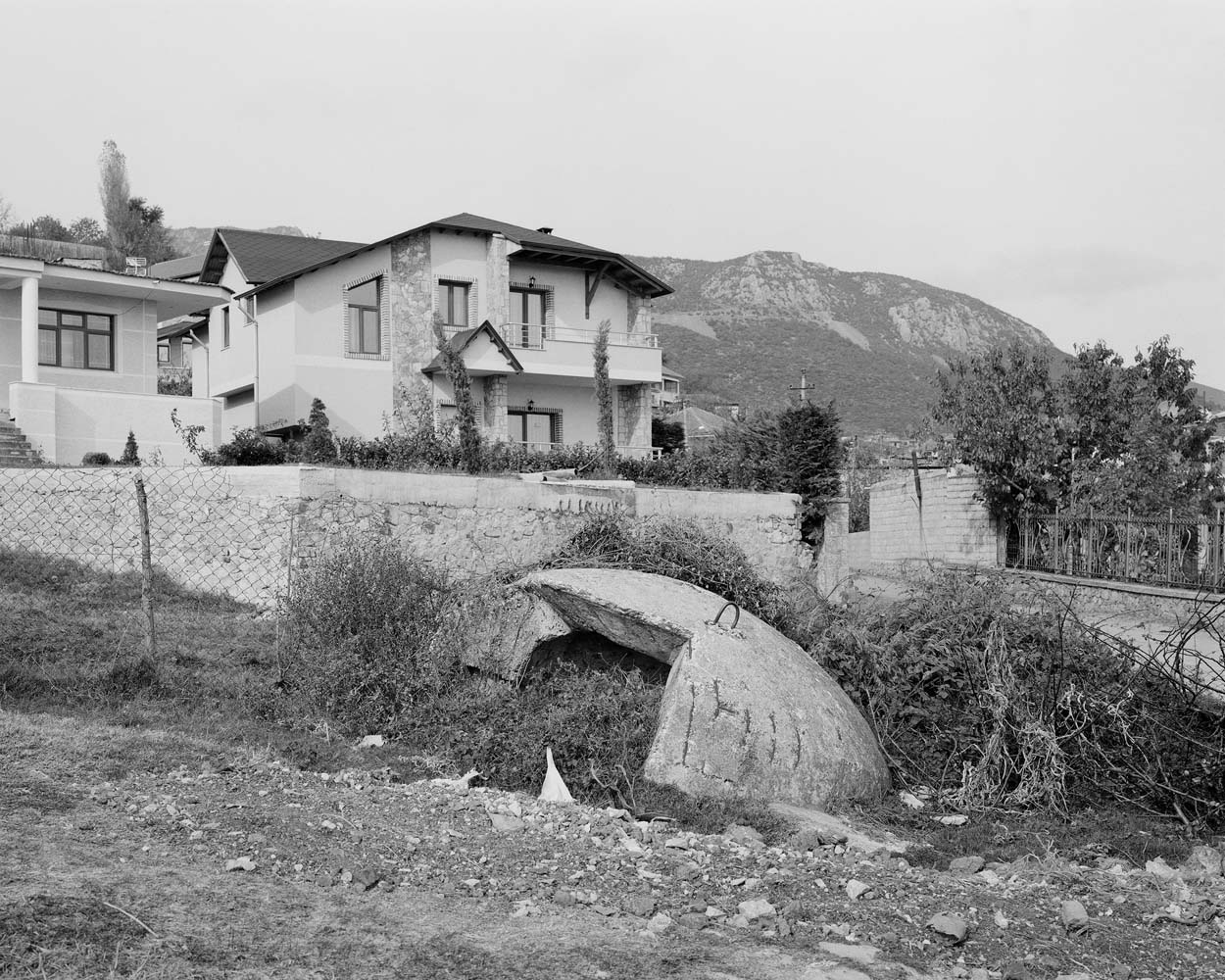 Collapsed QZ bunker in Memëlisht. Qender Zjarri (firing position) bunkers are the most common ones in the country.