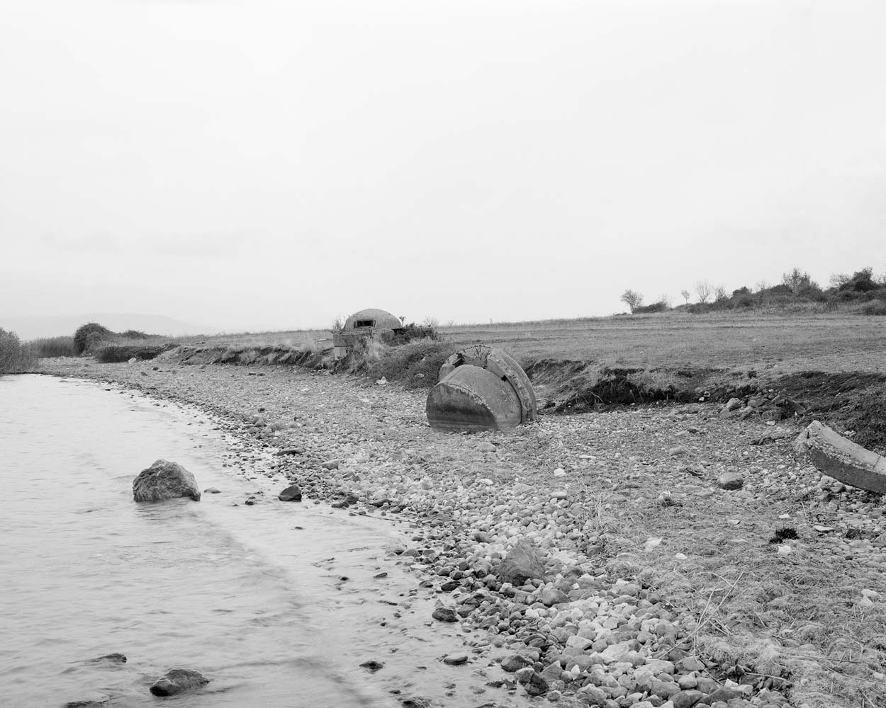 Collapsed bunkers on the banks of Lake Ohrid, Pogradec