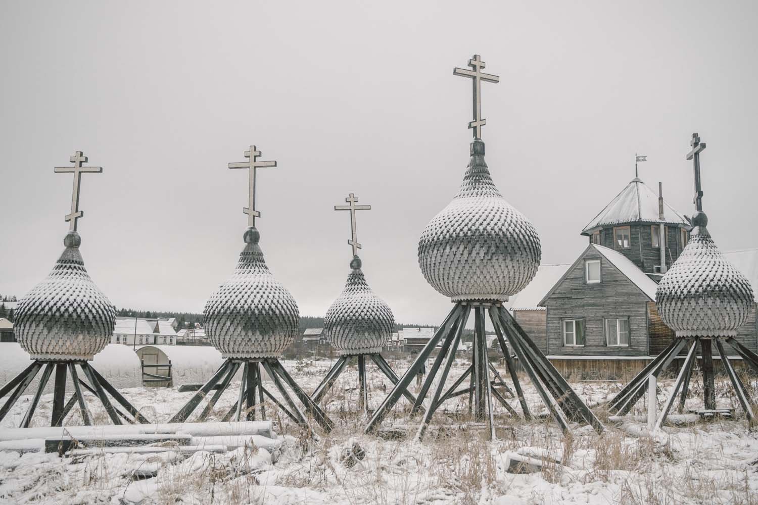 Domes for the restored St. Nicholas Church in the village of Varzuga.