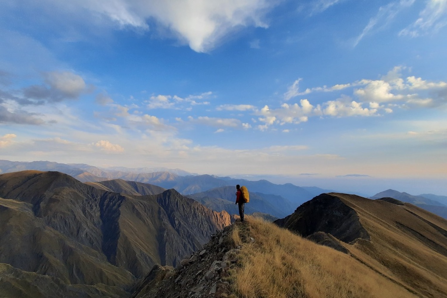A hiker pauses along a trail in Azerbaijan. Image courtesy of the Transcaucasian Trail Association