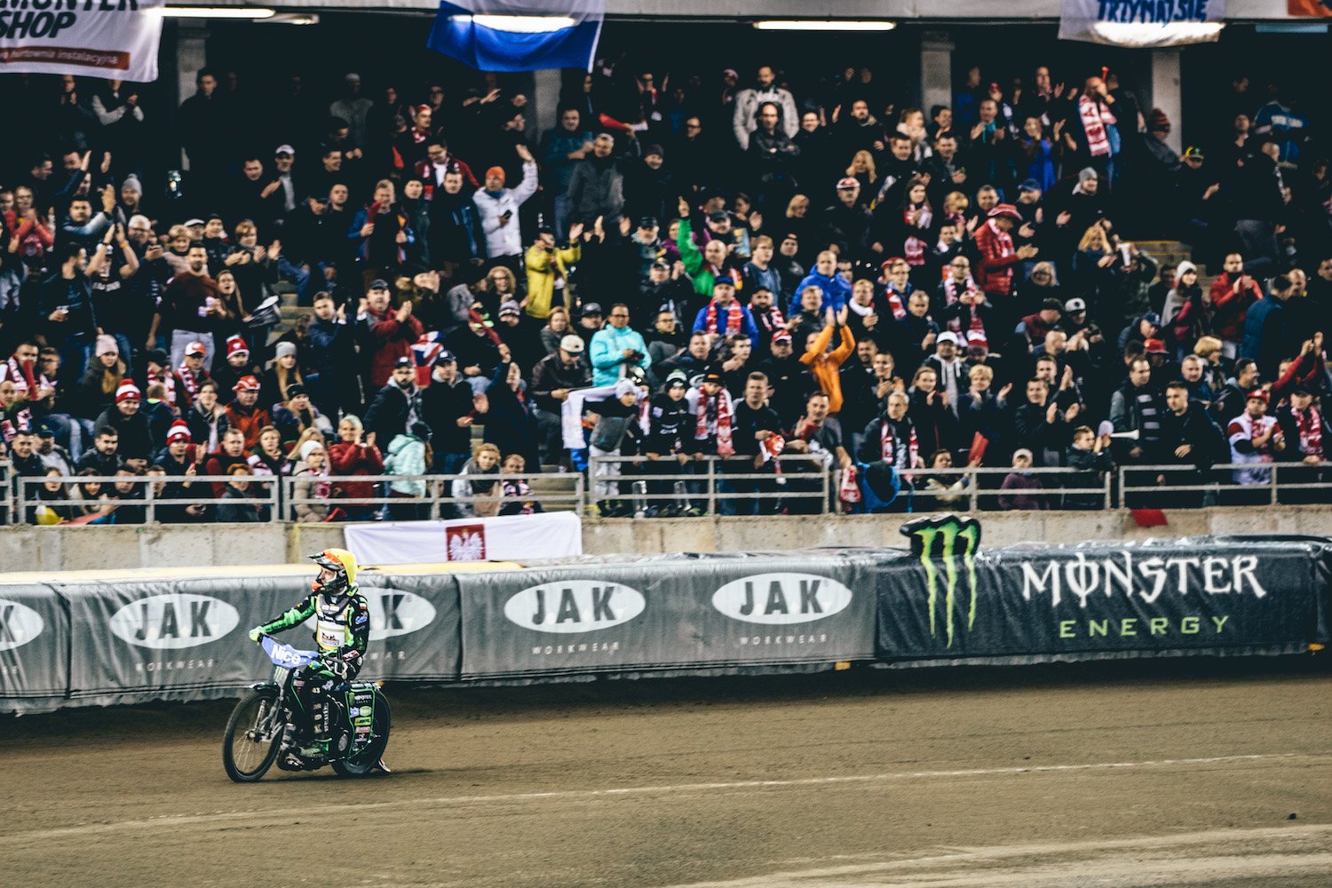 Pawel Przedpelski broadsiding left to the cheers of a packed stadium.