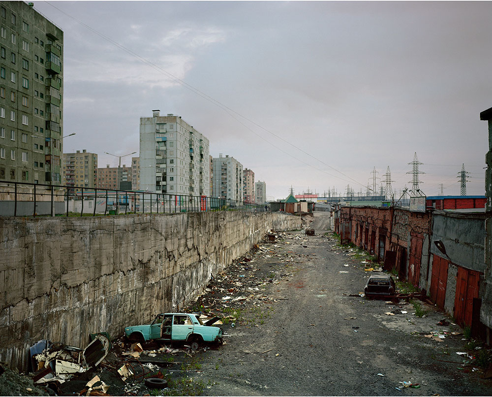 Residents take shelter from harsh conditions in towering apartment blocks.