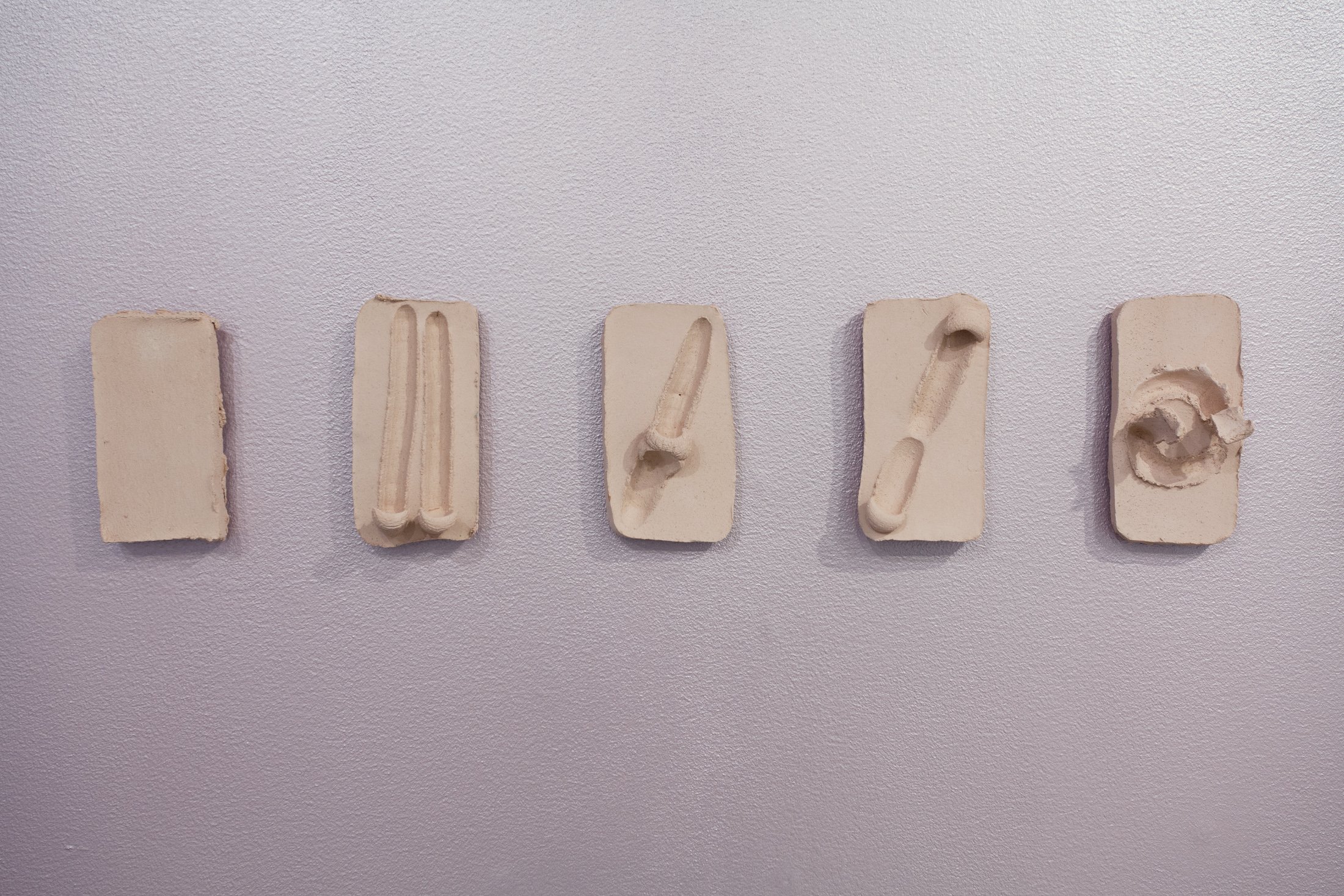 Swipe, Swipe, Swipe, 2017. Signal Center of Contemporary Art, Malmö. Here, Apple-owned “swipe,” “slide to unlock,” and “pinch-to-zoom” gestures that are performed by millions every day are imprinted in clay