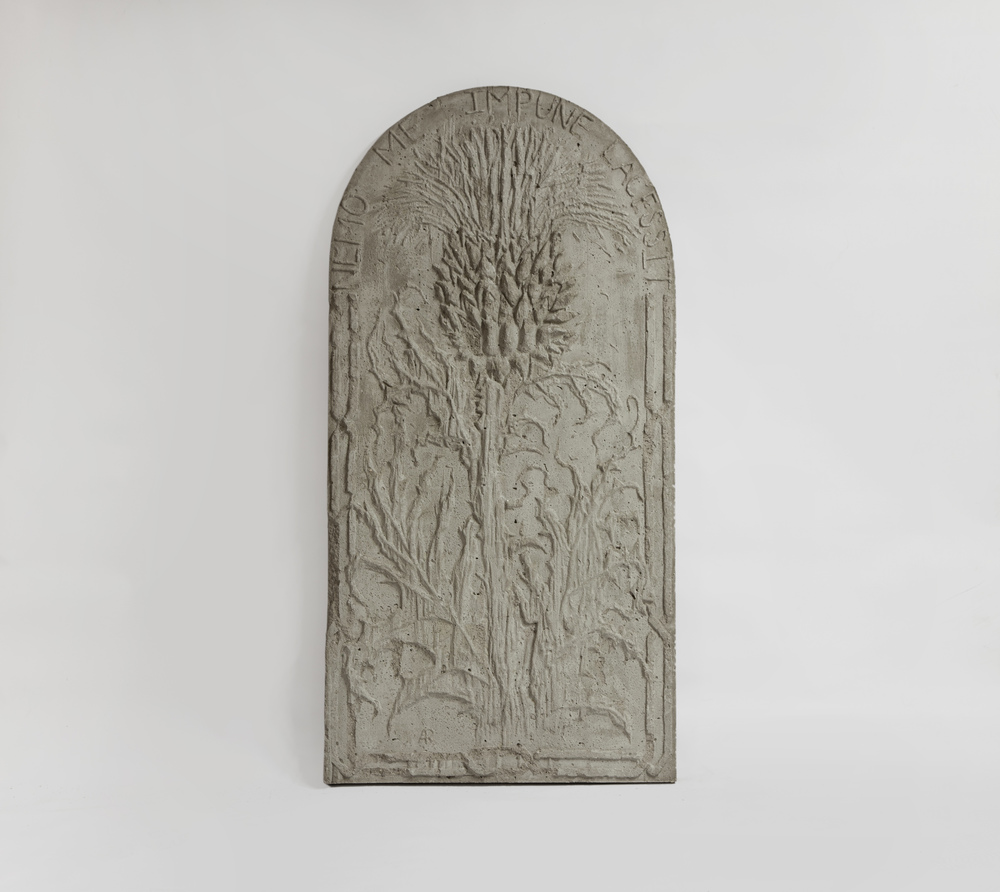 Nemo Me Impune Lacessit (“No one can harm me unpunished”), 2017. The artist creates a tension between the material, ordinary concrete, and the form of an ancient inscription