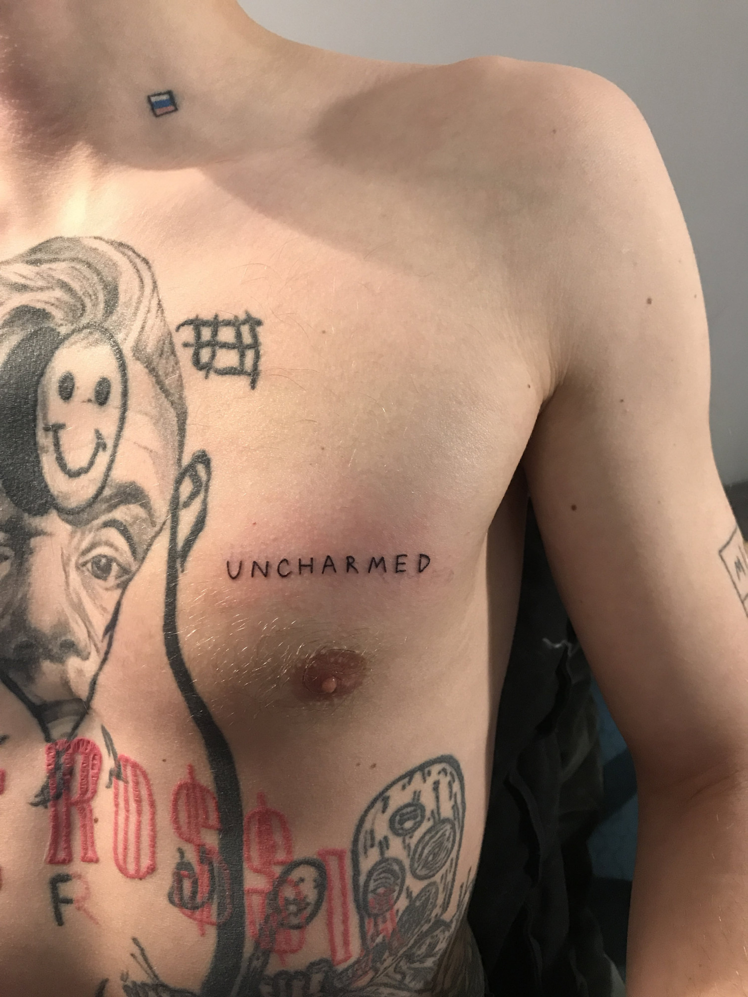 UNCHARMED tattoo